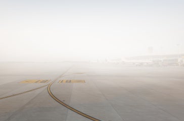 Foggy airport runway